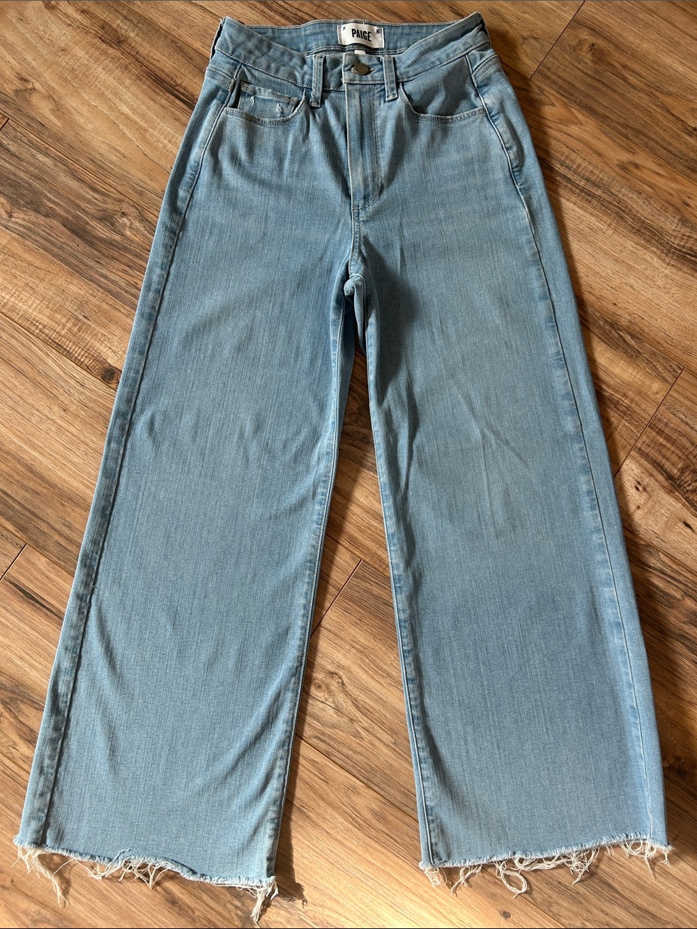 PAIGE Genesee Crop Light Blue Wide-Leg Raw Hem Jeans